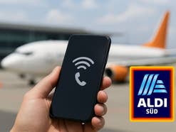 Aldi Talk hat neue Roaming-Tarife Ein Smartphone und ein Aldi-Logo, im Hintergrund ein Flugzeug